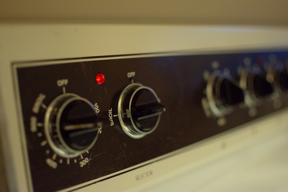 a close up view of the knobs on a stove