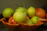 Close-up of a ceramic fruit bowl filled with fresh colorful fruits on a modern kitchen counter.
