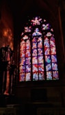A beautiful stained glass window showcasing biblical scenes.