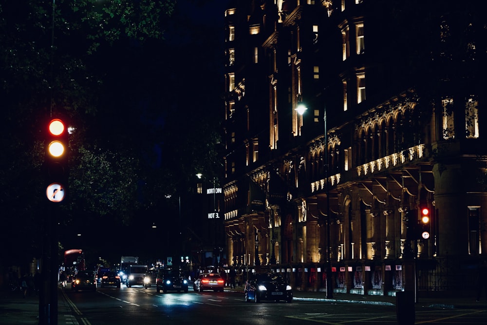 a traffic light on a city street at night