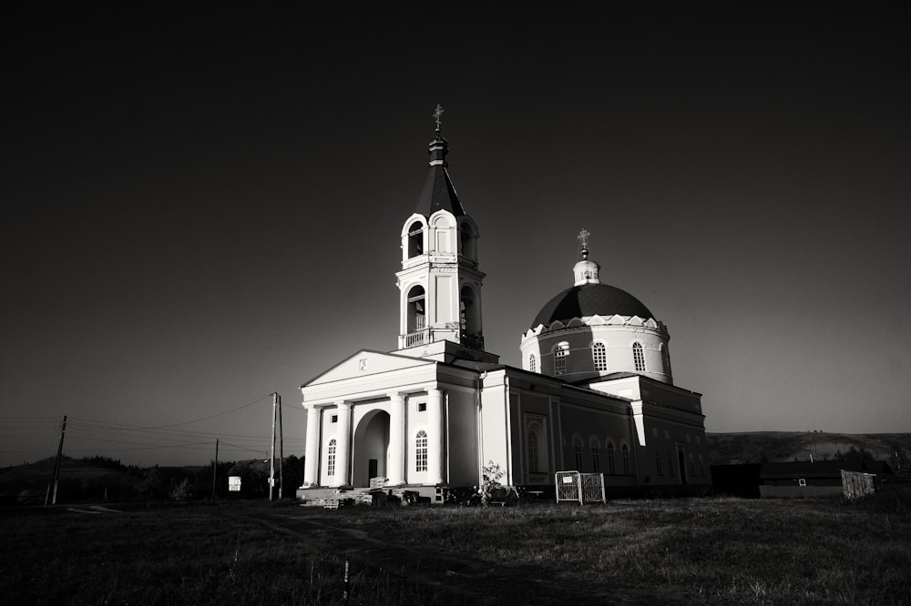 a black and white photo of a church