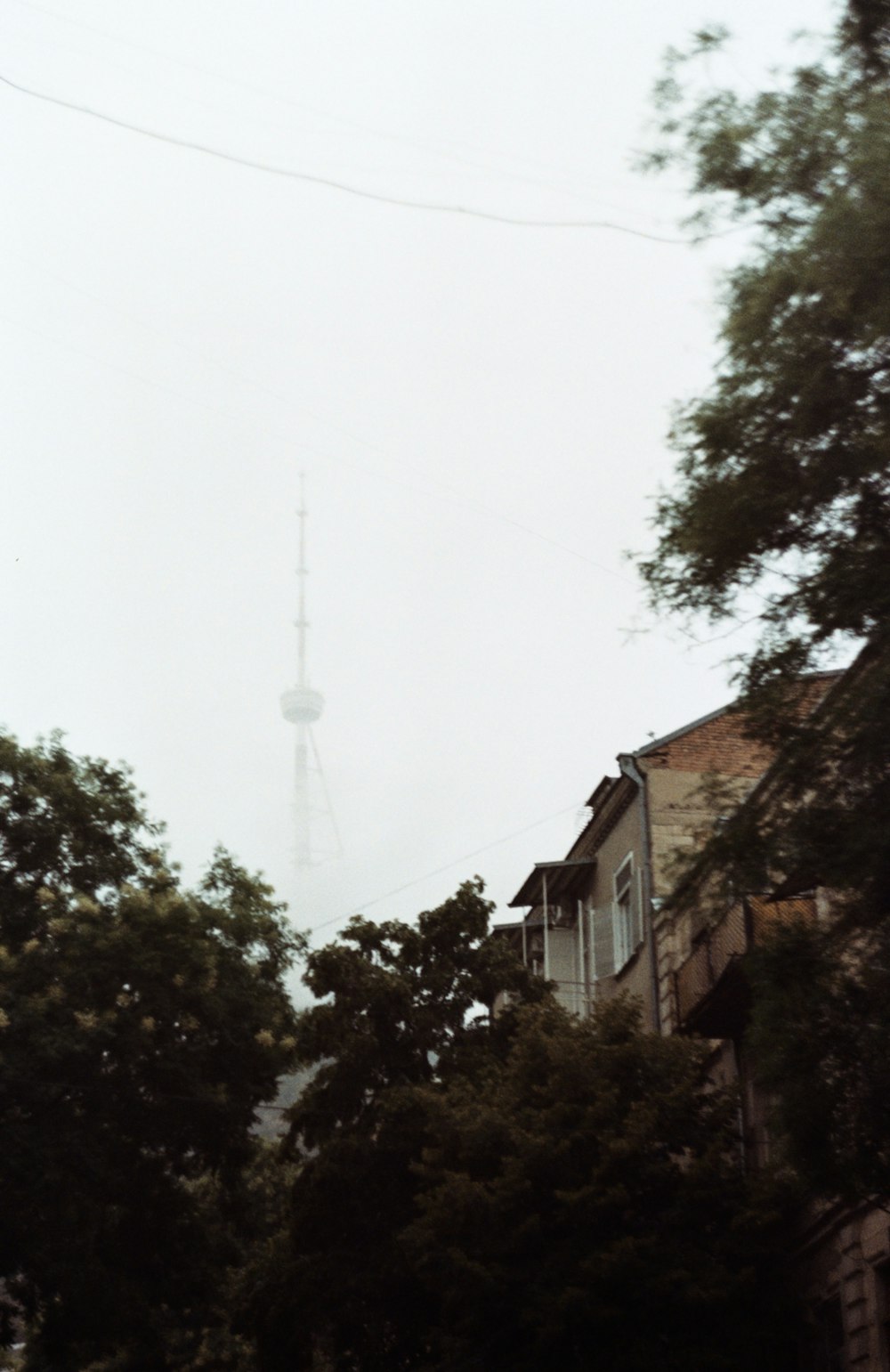 a view of a very tall tower in the distance
