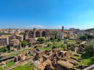 A panoramic view of the ancient ruins of Baalbek in Lebanon, bathed in soft morning light.
