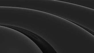 An artistic composition highlighting the contrast between matte and glossy surfaces in a design showcase.