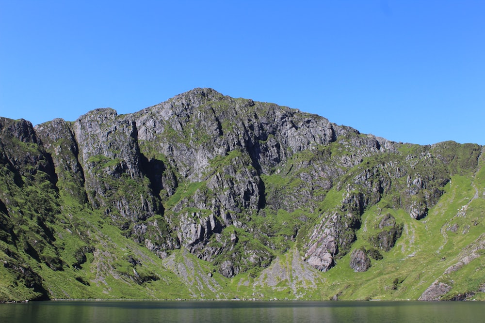 a mountain with a lake in front of it