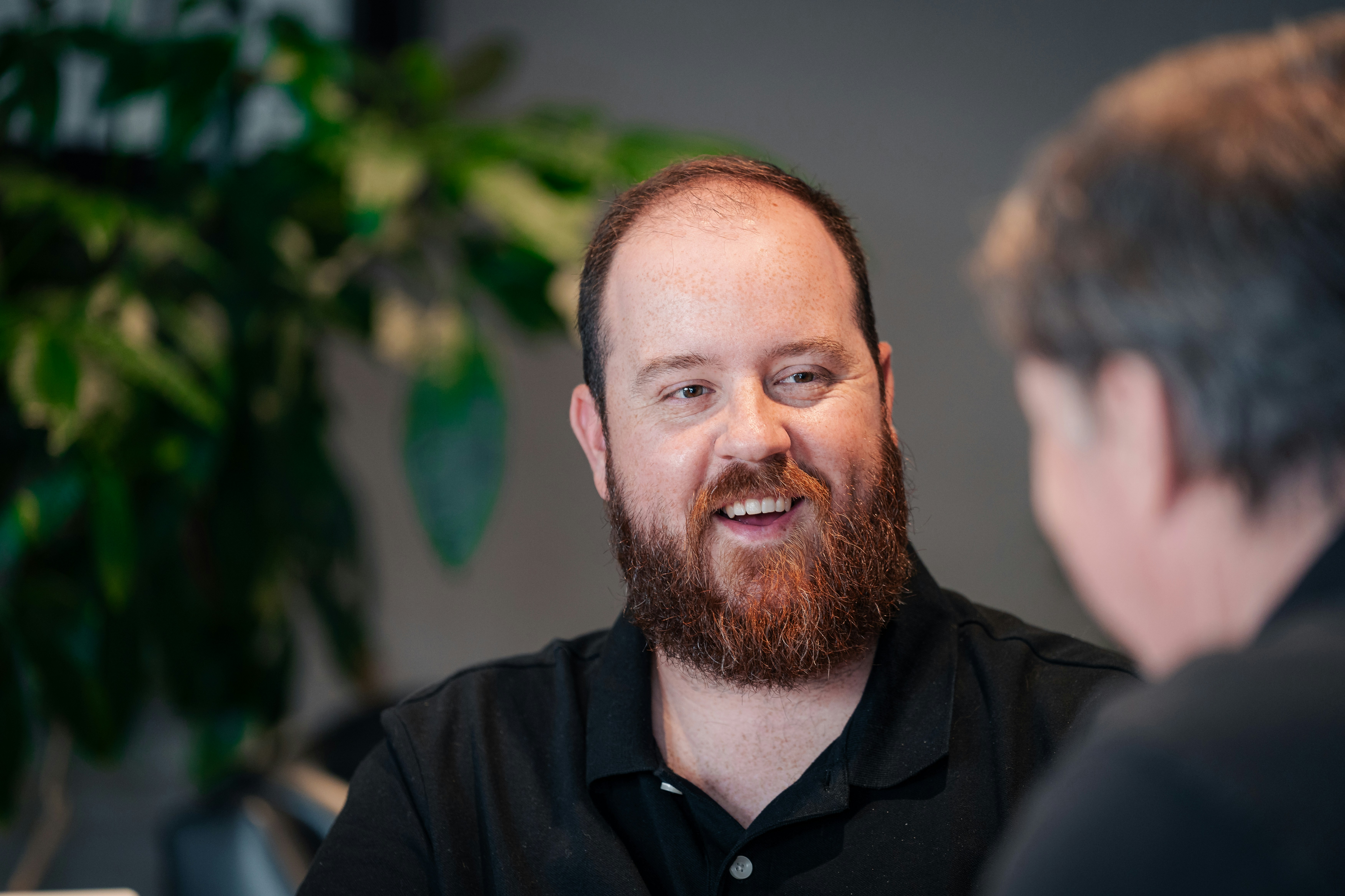 Man talking to another man