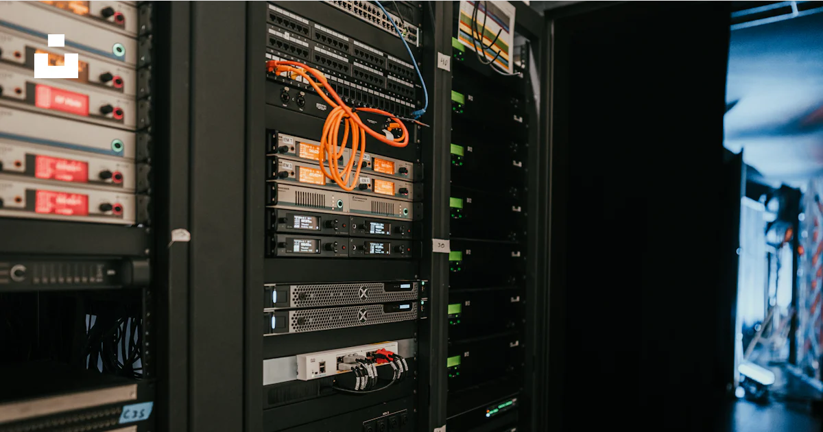 A rack of servers in a server room photo – Free Computer Image on Unsplash