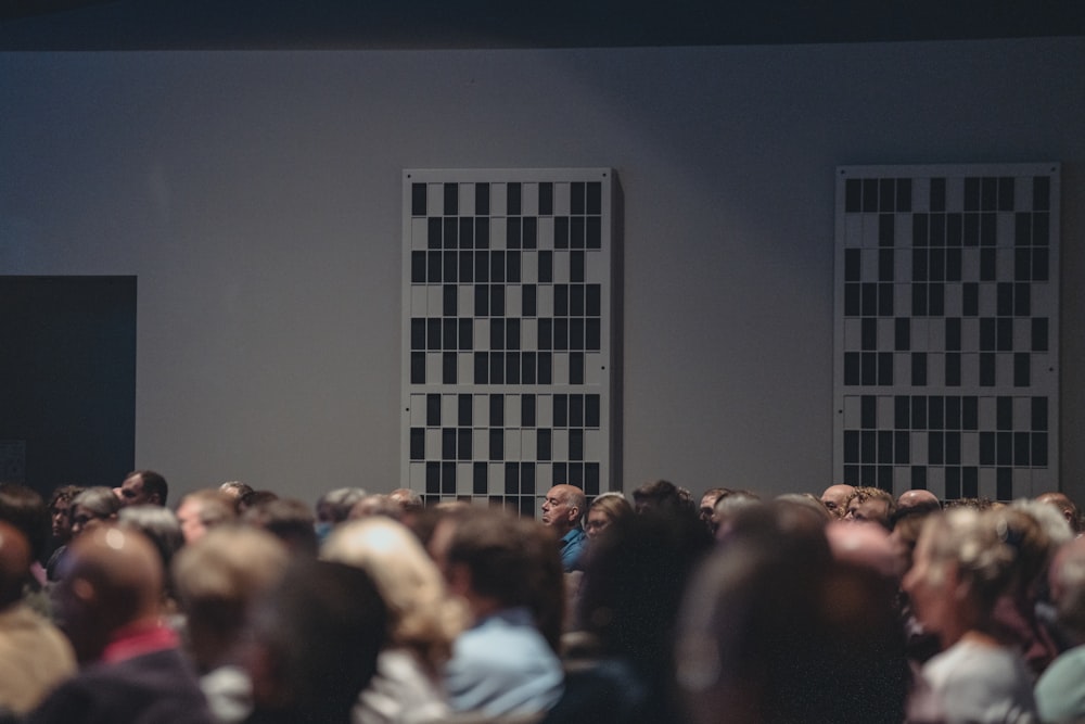 a large group of people in a room