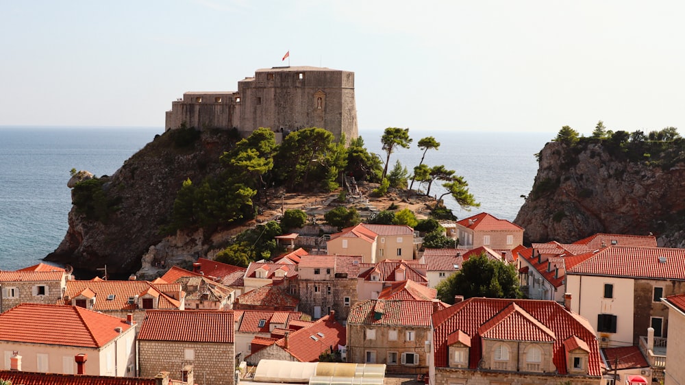 a view of a city with a castle on top of it