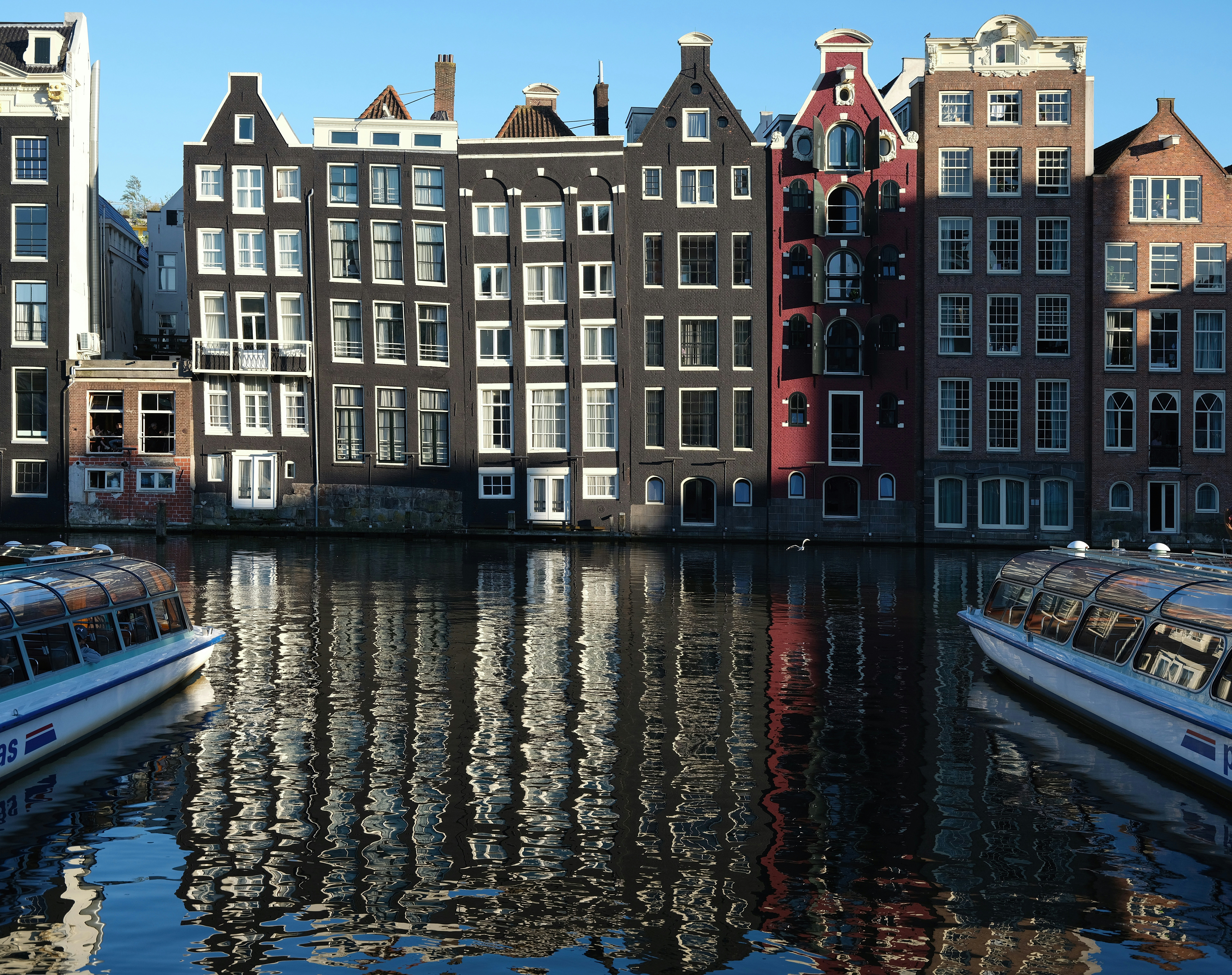 a couple of boats that are sitting in the water