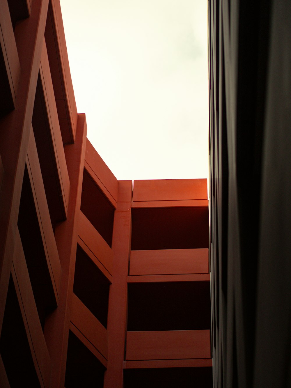 a view of the sky from inside a building