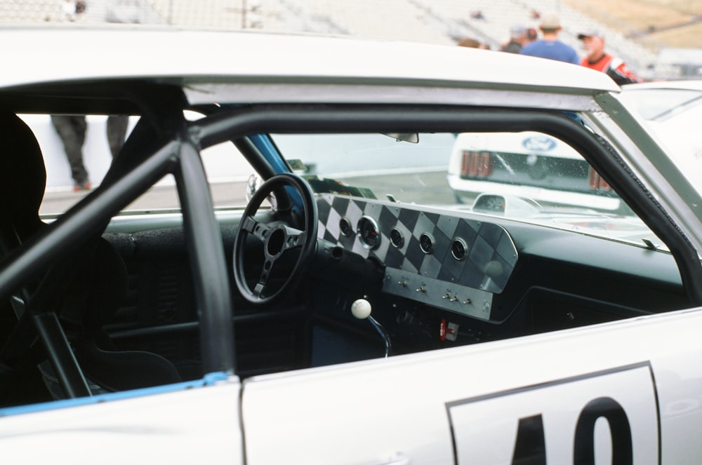 a close up of a car with a checkered dashboard