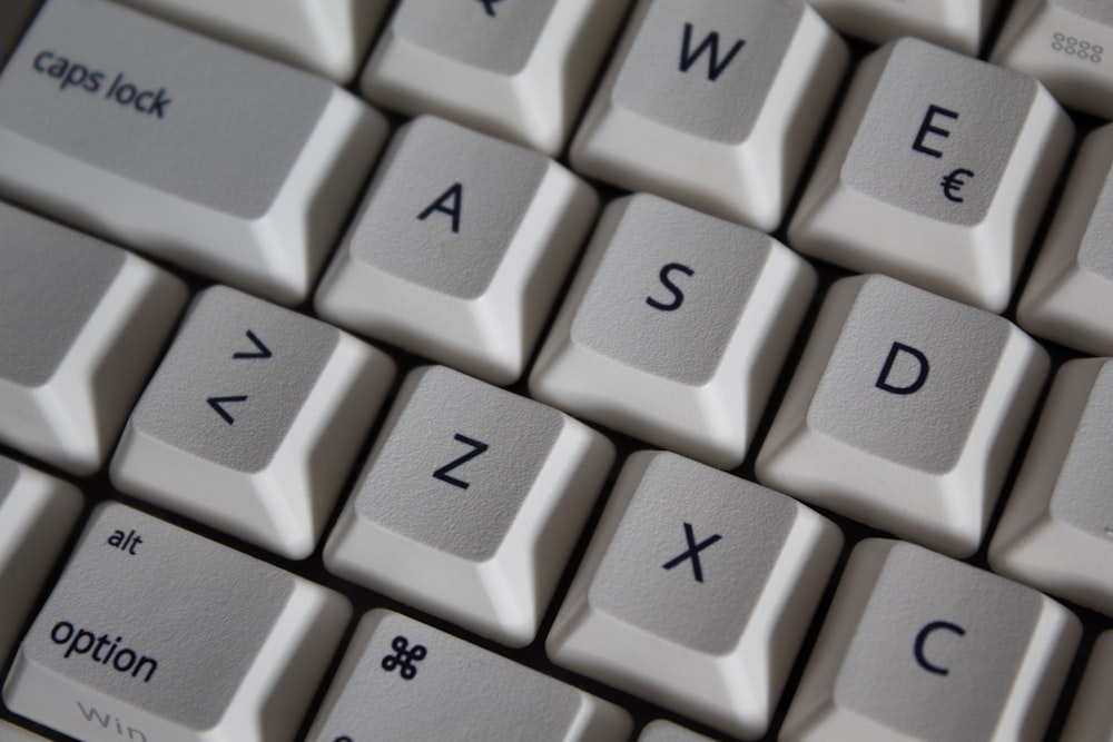 a close up of a computer keyboard with the keys missing