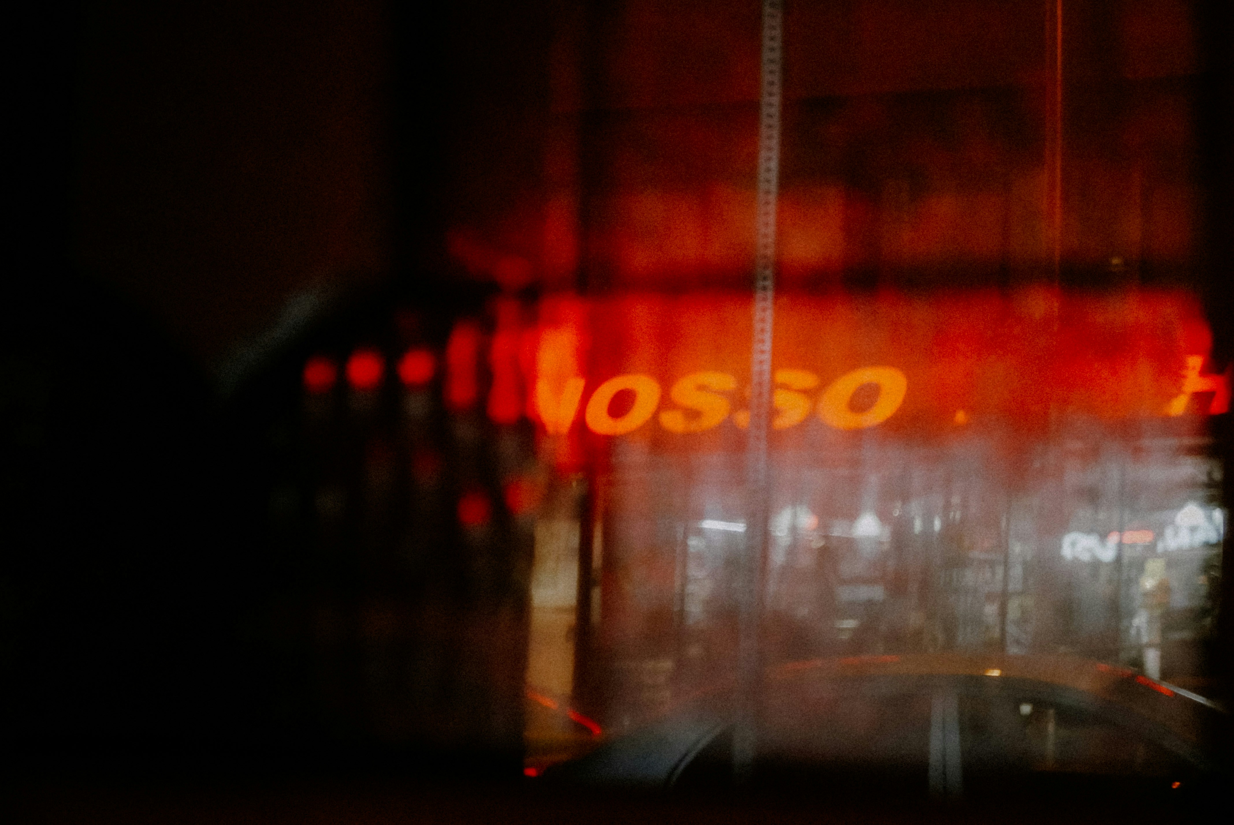 a blurry photo of a bus at night