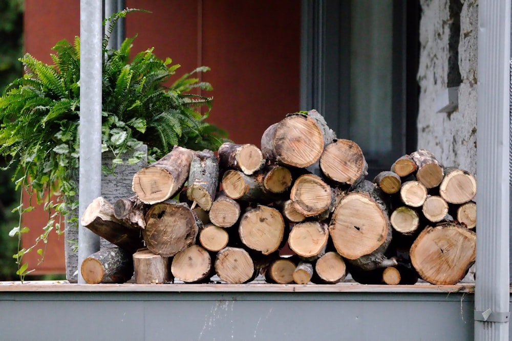 a pile of wood sitting on top of a wooden table