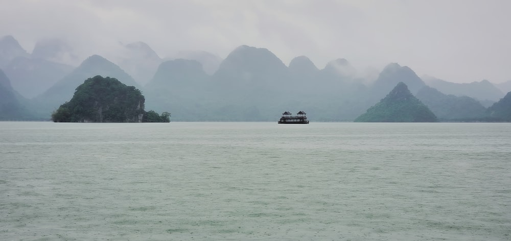 a boat traveling across a large body of water