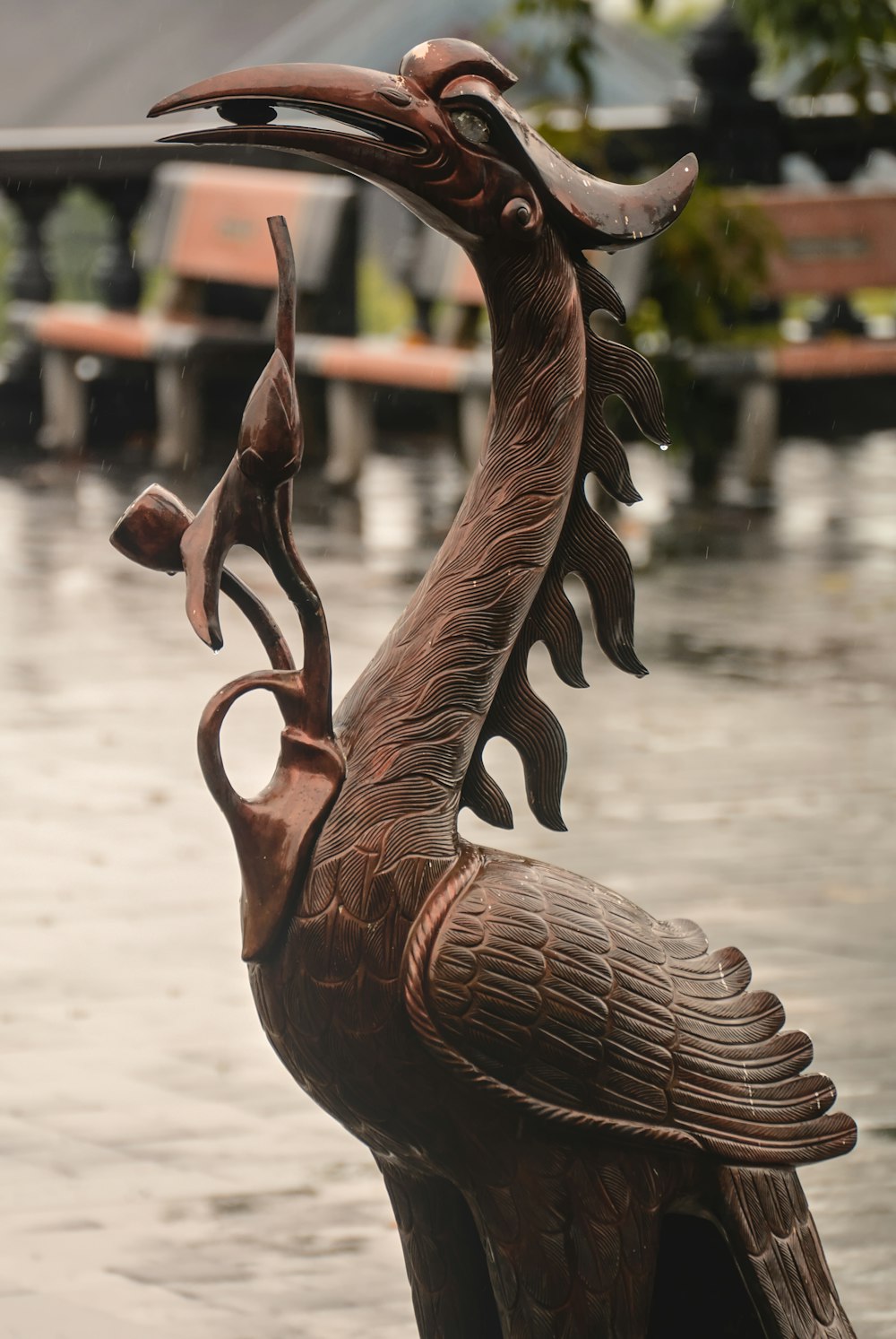 a statue of a bird with a long beak