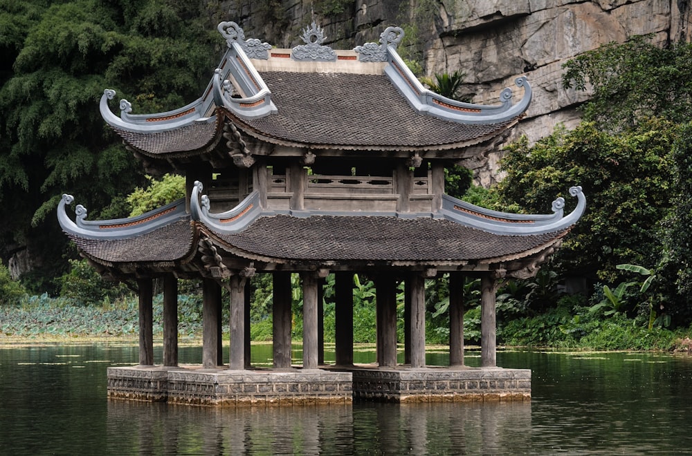 a building sitting on top of a body of water