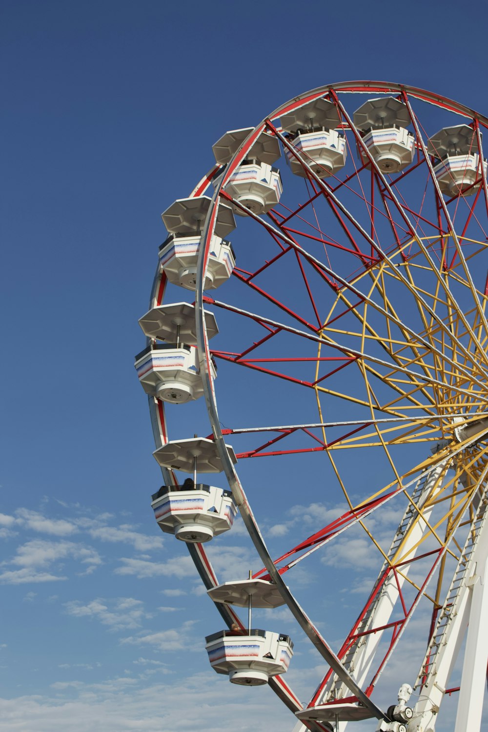 a ferris wheel with a blue sky in the background