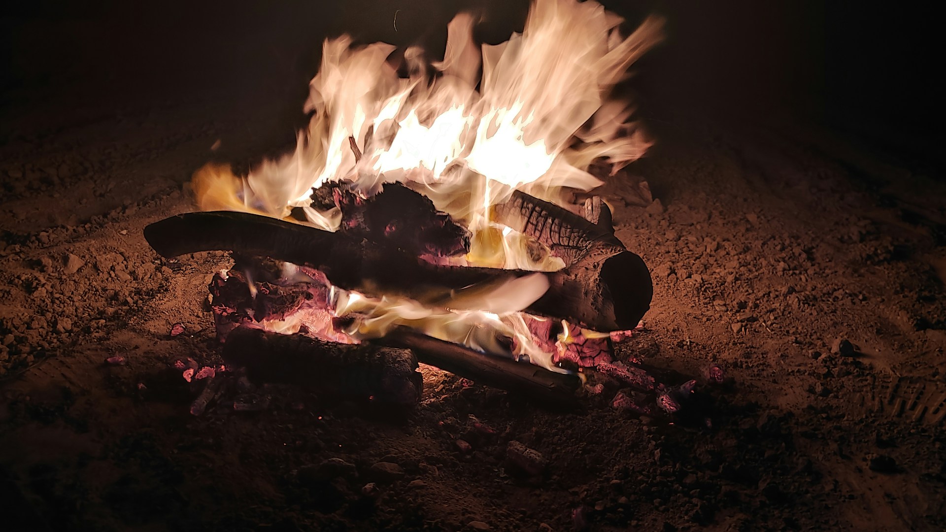 woman wearing yellow long-sleeved dress under white clouds and blue sky during daytime
