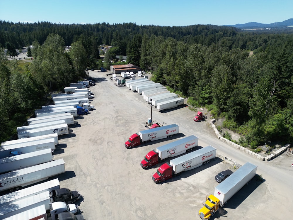 a large group of trucks parked in a parking lot