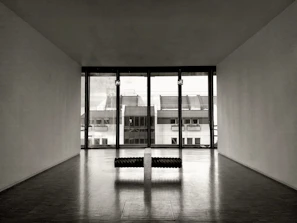 A pristine living room with polished floors and dust-free surfaces.