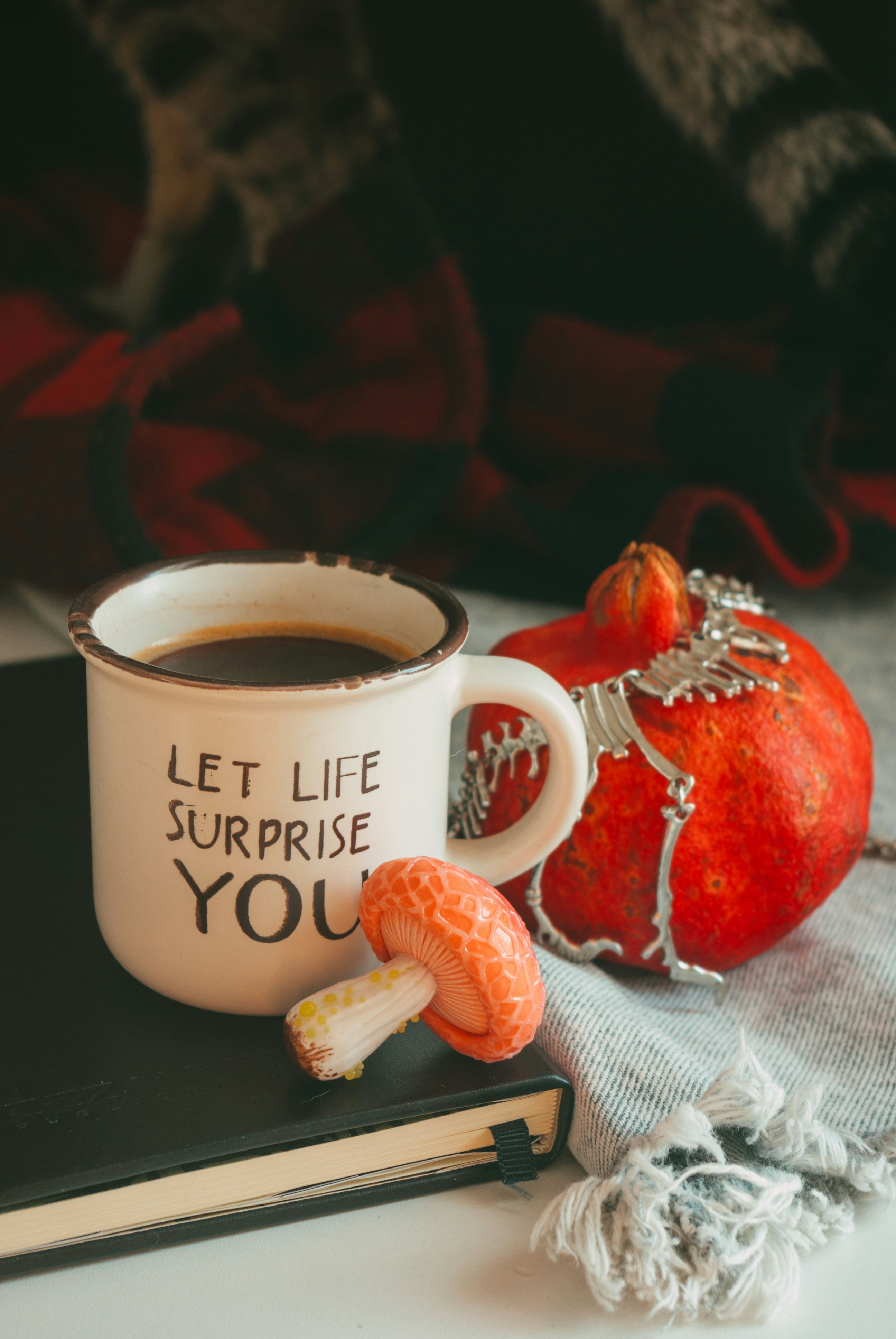 Image of lion's mane mushroom next to a cup of mushroom coffee