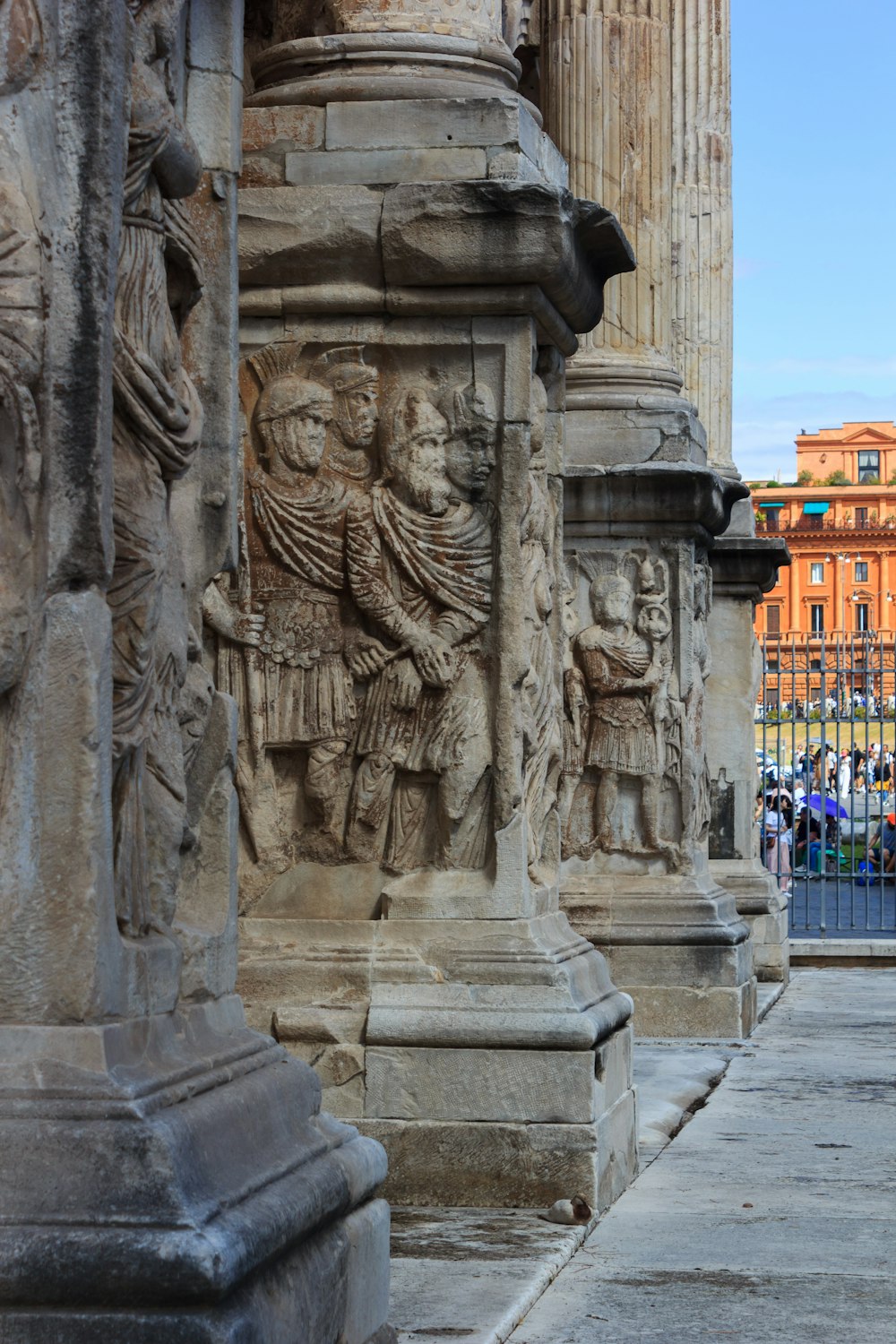 a group of statues on the side of a building