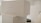 Stacked white boxes with minimalistic design featuring a label 'COLLECTION 1'. The setting appears to be clean and well-organized, possibly in a storage or retail environment.