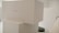 Stacked white boxes with minimalistic design featuring a label 'COLLECTION 1'. The setting appears to be clean and well-organized, possibly in a storage or retail environment.