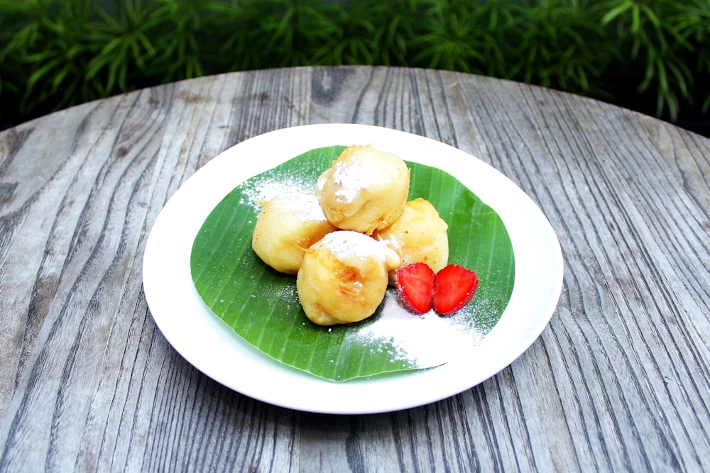 a plate of food on a wooden table