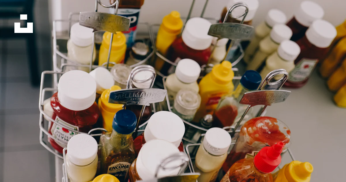 A metal basket filled with lots of condiments photo – Free Food Image ...