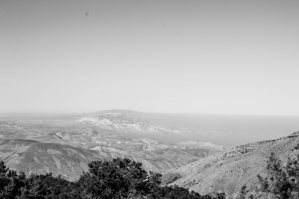 a black and white photo of a mountain range