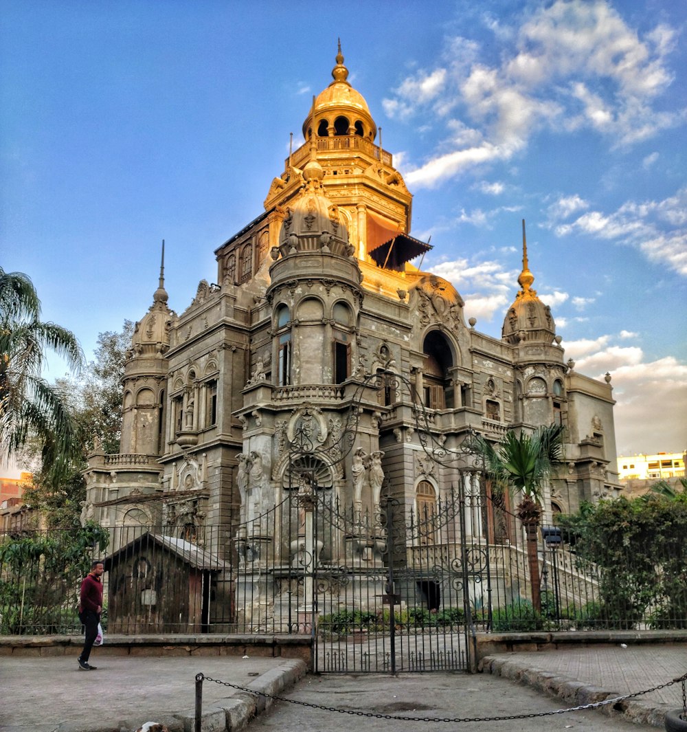 a large building with a golden dome on top of it