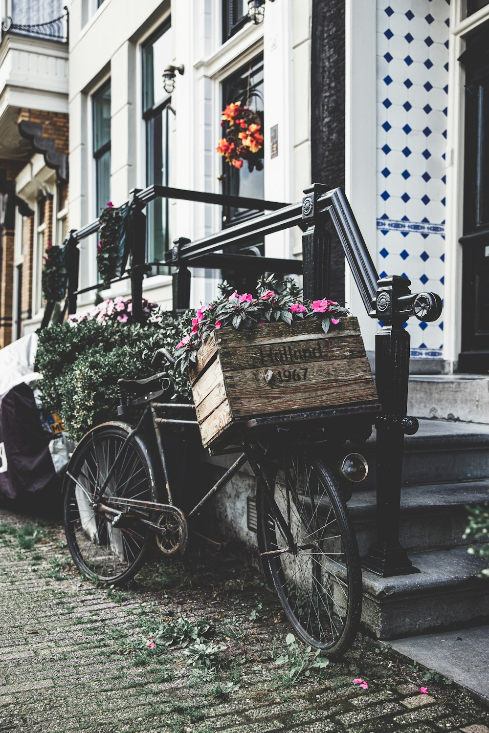 a bicycle with a wooden crate on the front of it