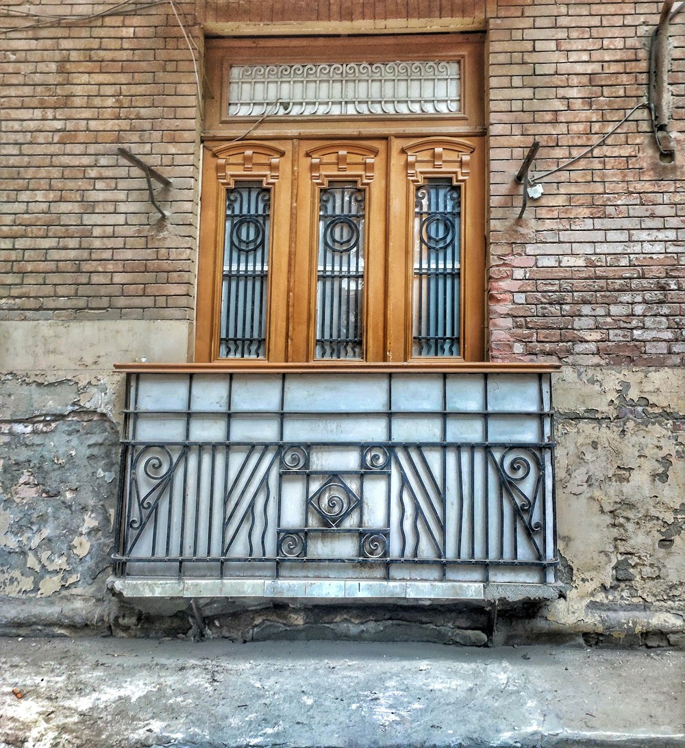 a building with two doors and a window