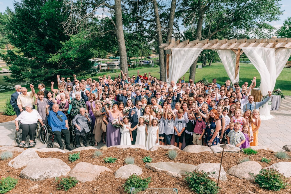 a large group of people posing for a picture