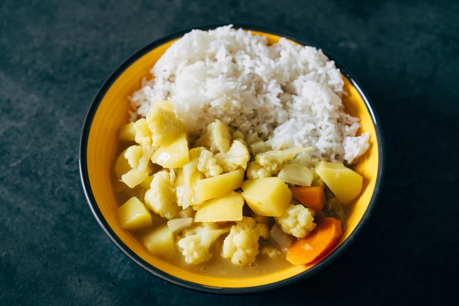 A bowl of rice and slow-cooked vegetables