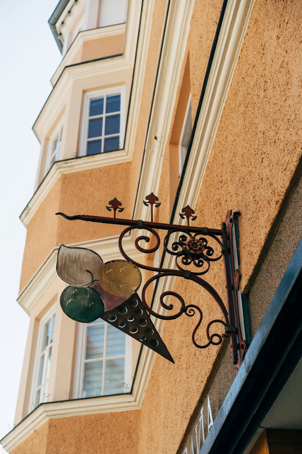 a street light hanging from the side of a building