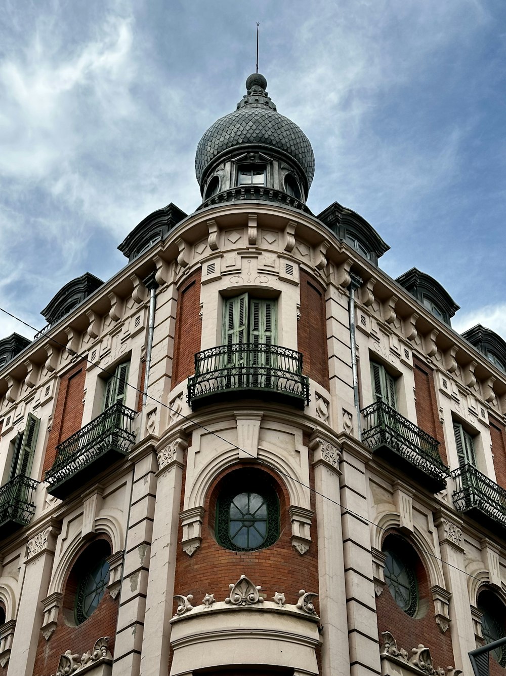 a tall building with a clock on the top of it