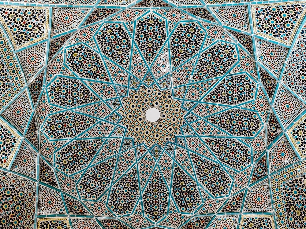 a close up view of a decorative ceiling in a building