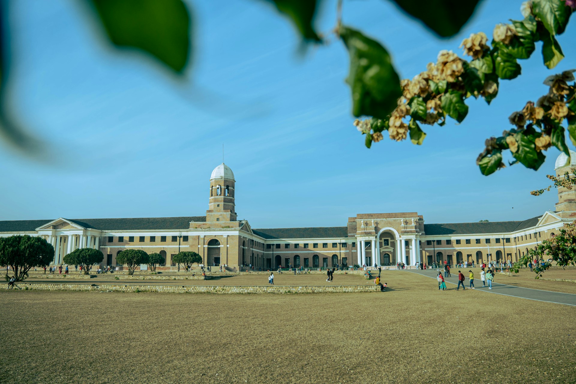 a large building with a clock tower in the middle of it