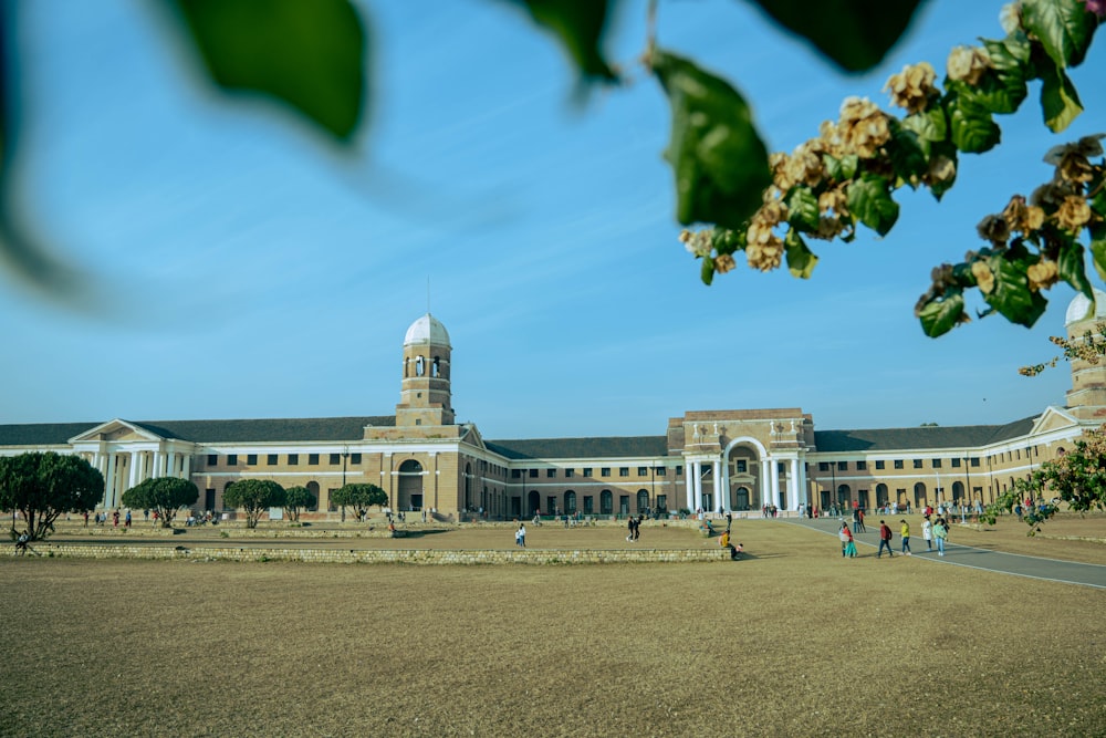 a large building with a clock tower in the middle of it