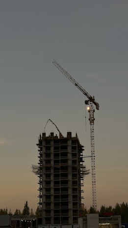 a crane that is on top of a building