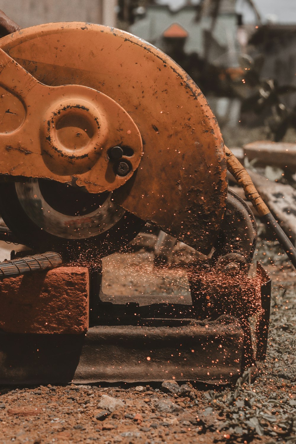 a close up of a machine cutting a piece of wood