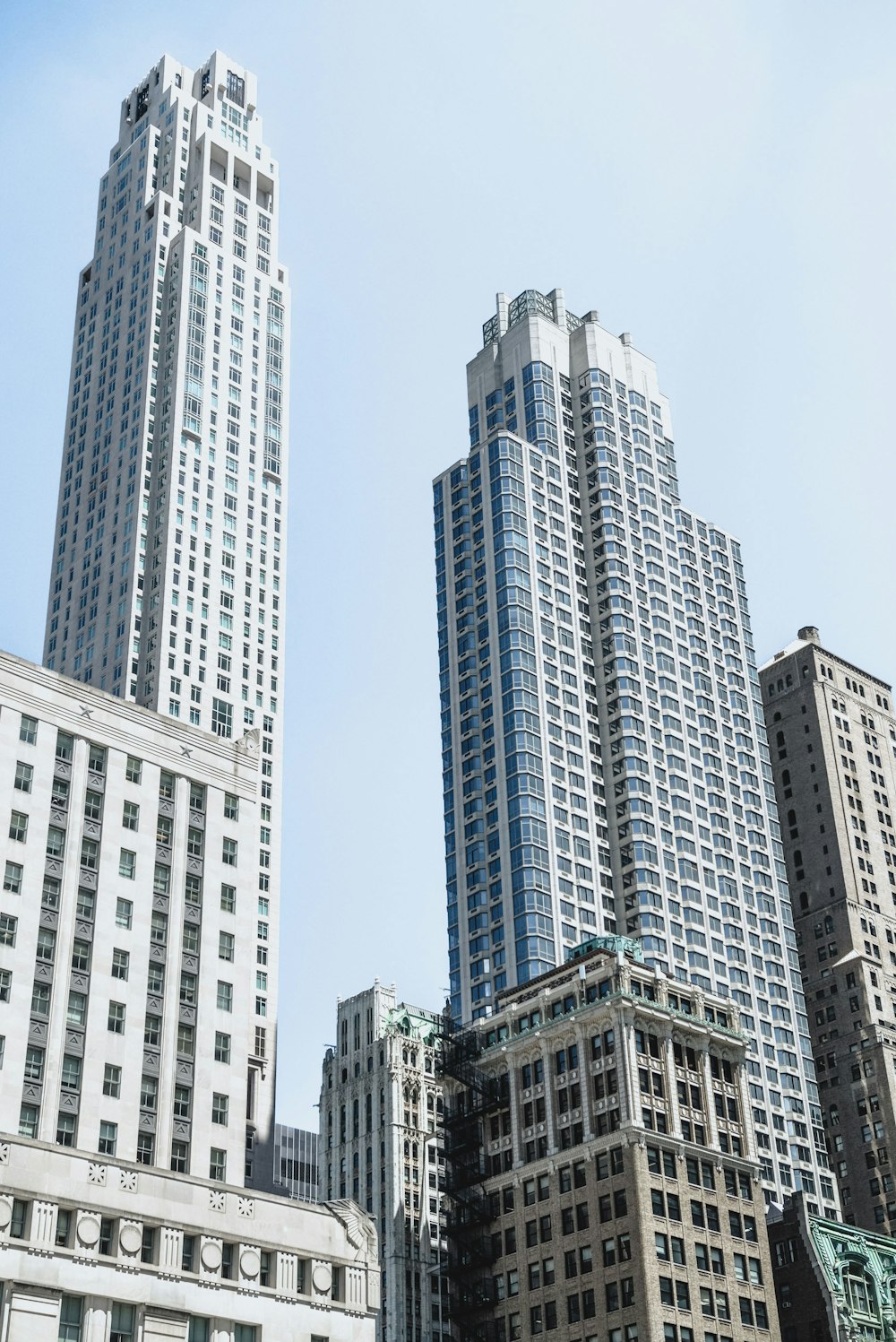 a group of tall buildings in a city