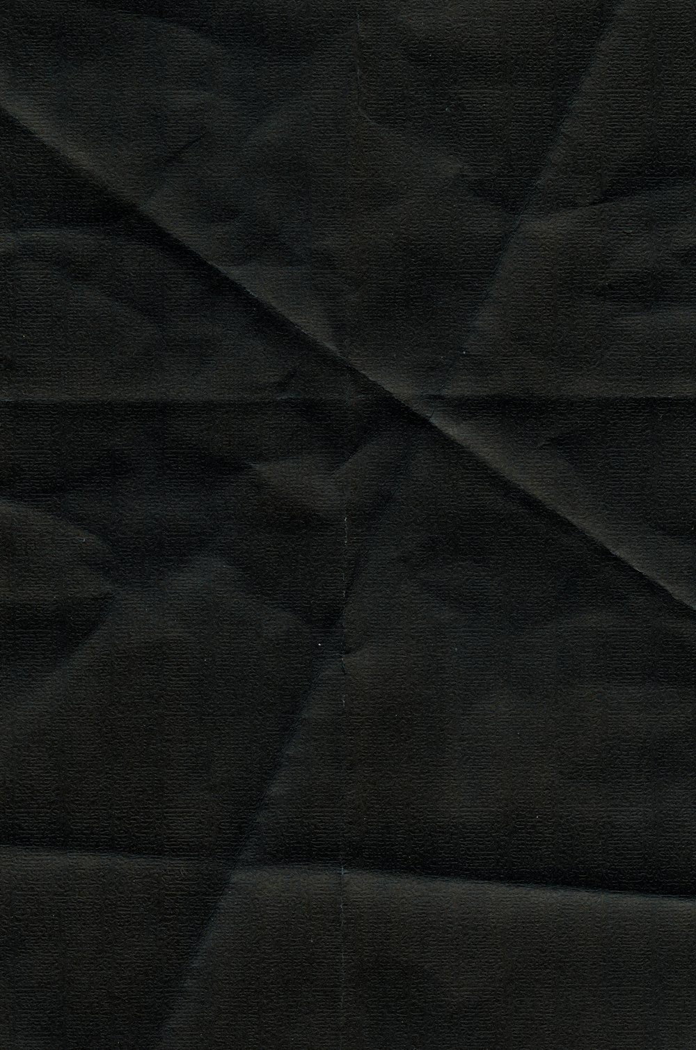 a close up of a black cloth texture