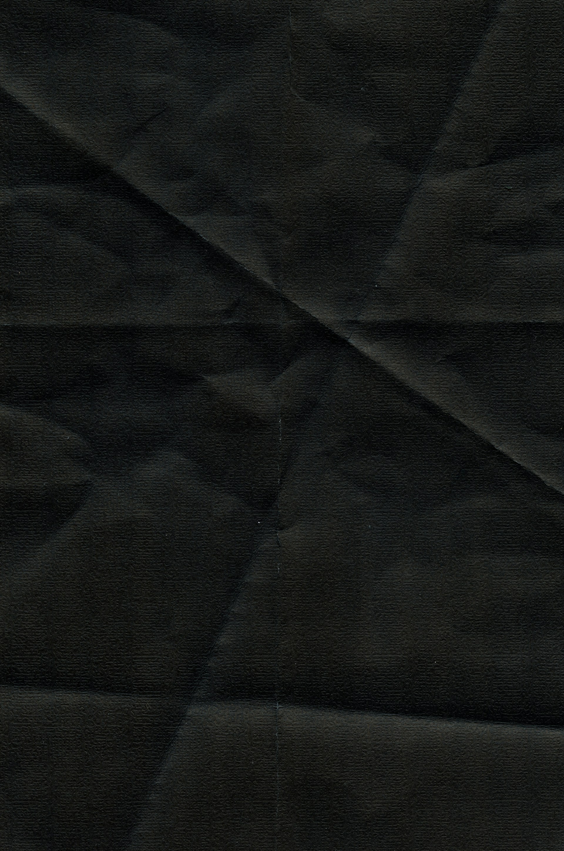 a close up of a black cloth texture