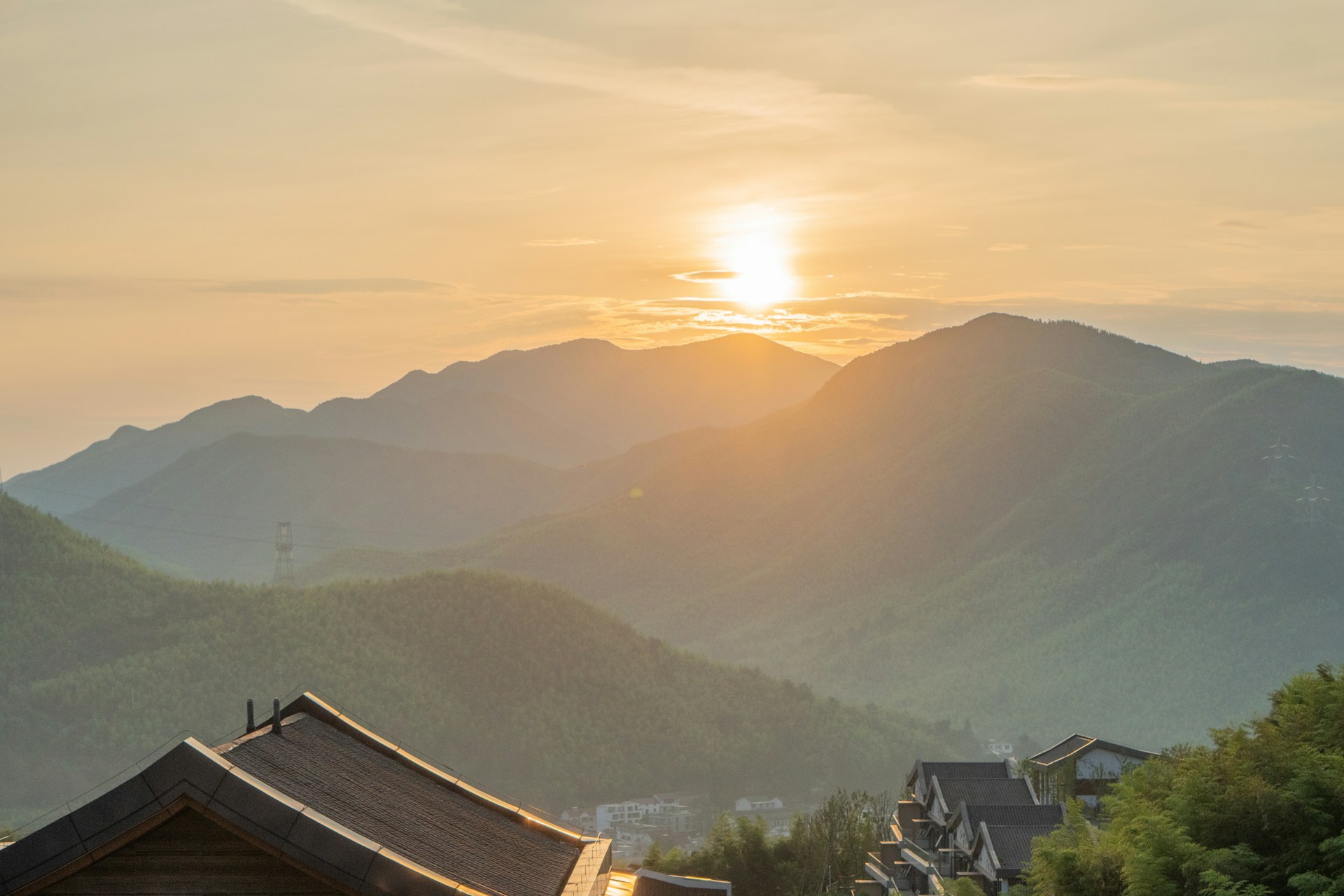 woman wearing yellow long-sleeved dress under white clouds and blue sky during daytime