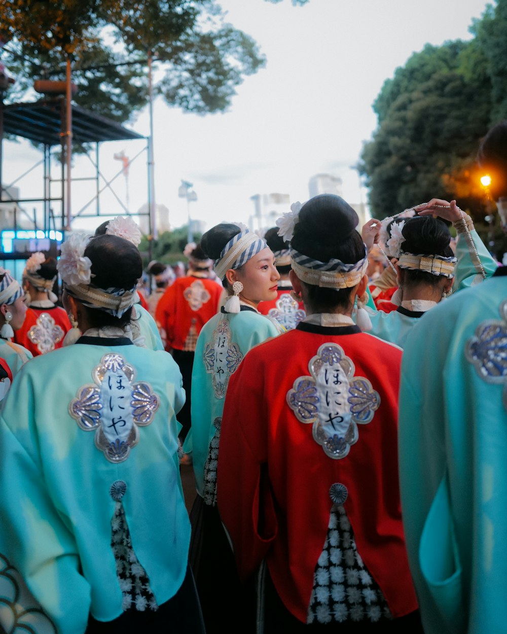 a group of people dressed in colorful clothing